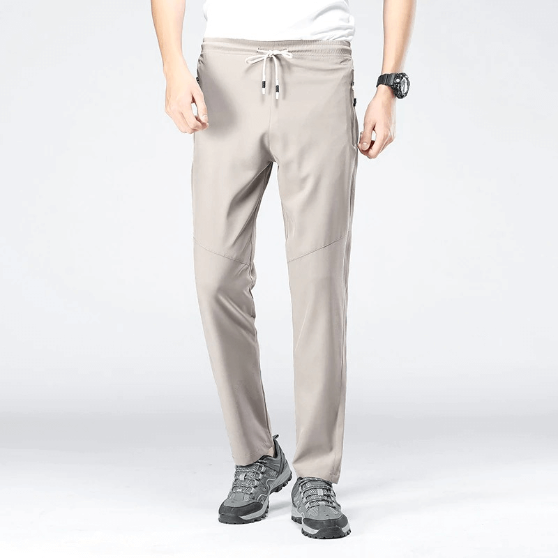 Sports Quick-Drying Men's Pants with Pockets in beige, full length with elastic waist, ideal for active outdoor adventures.